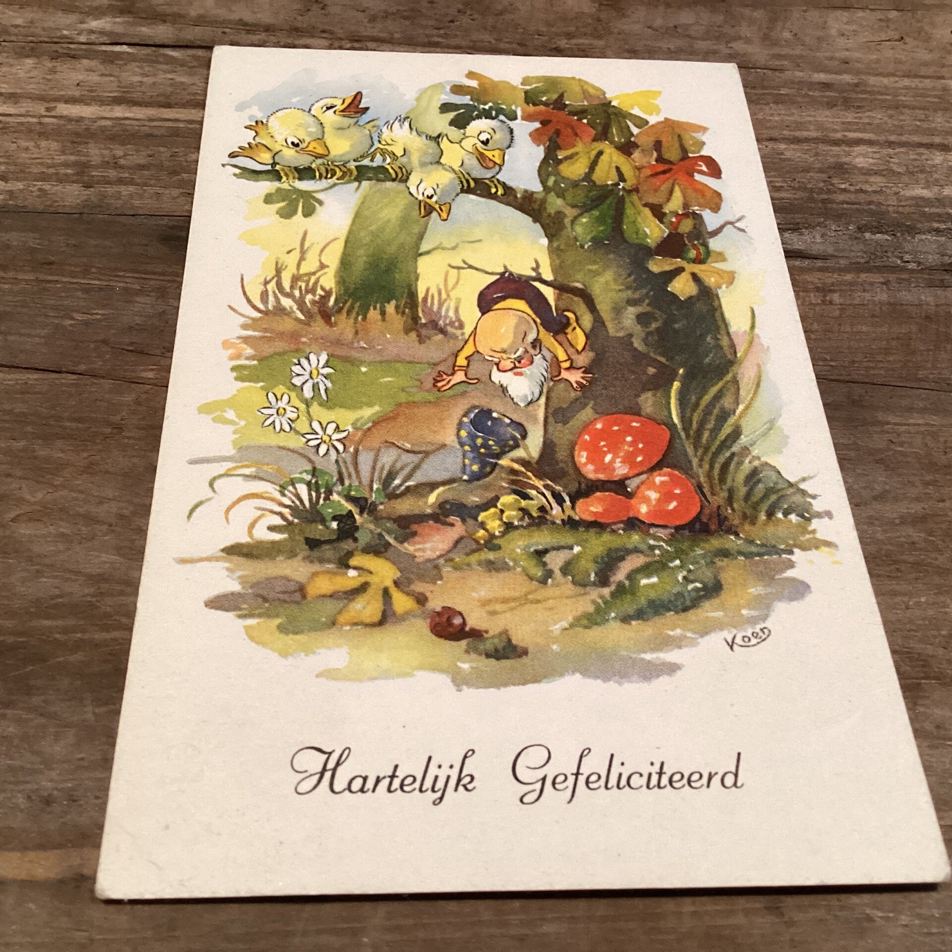 Oude verjaardagskaart met kabouter