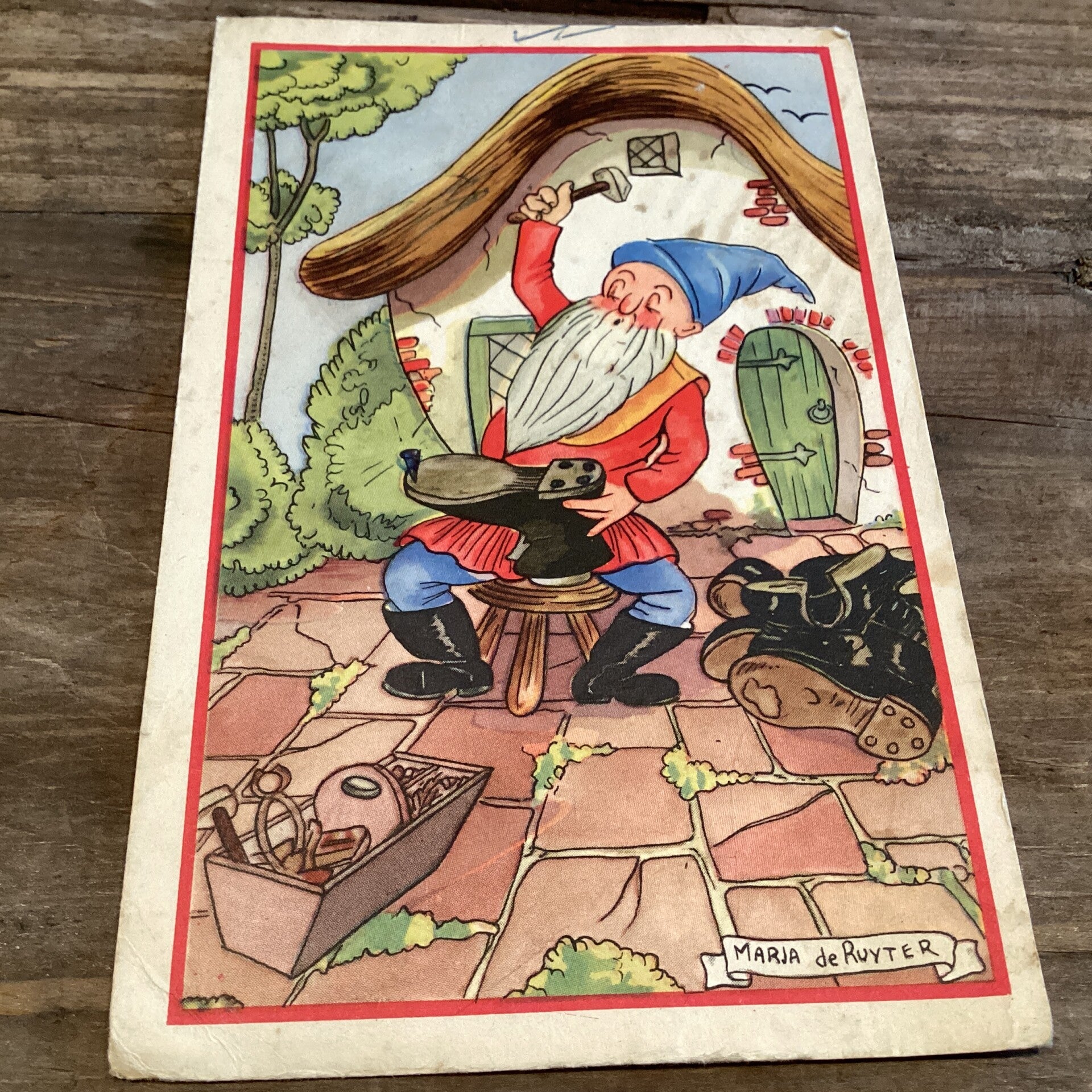 Oude kaart kabouter als schoenmaker illustrator 1950 Marja de Ruyter