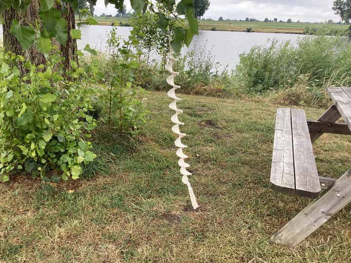 Windspinner met kwast en belletje, 1 meter