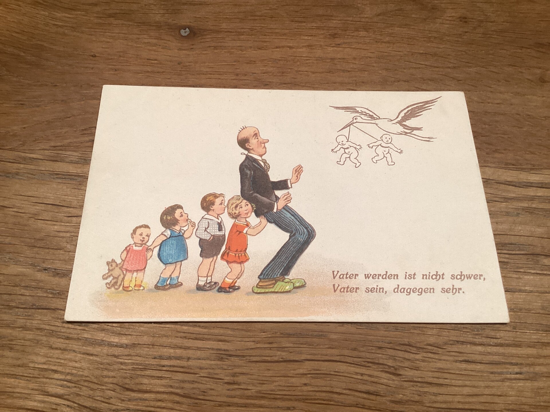 Antieke ansichtkaart met ooievaar, begin 1900