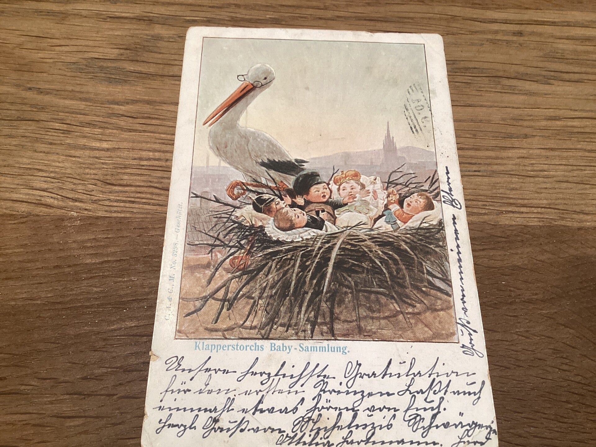 Antieke ansichtkaart met ooievaar, begin 1905