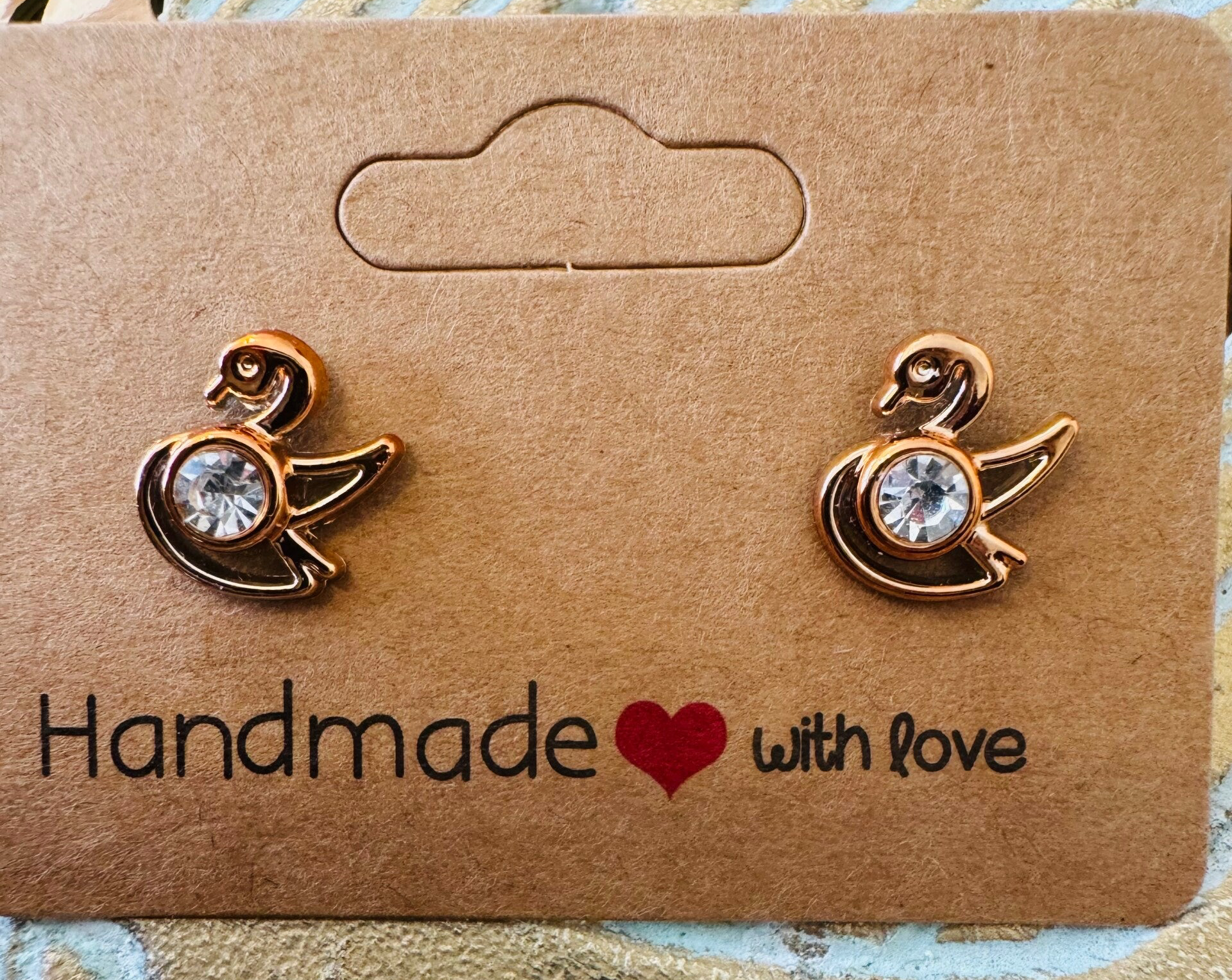 Gouden oorbellen ZWAAN