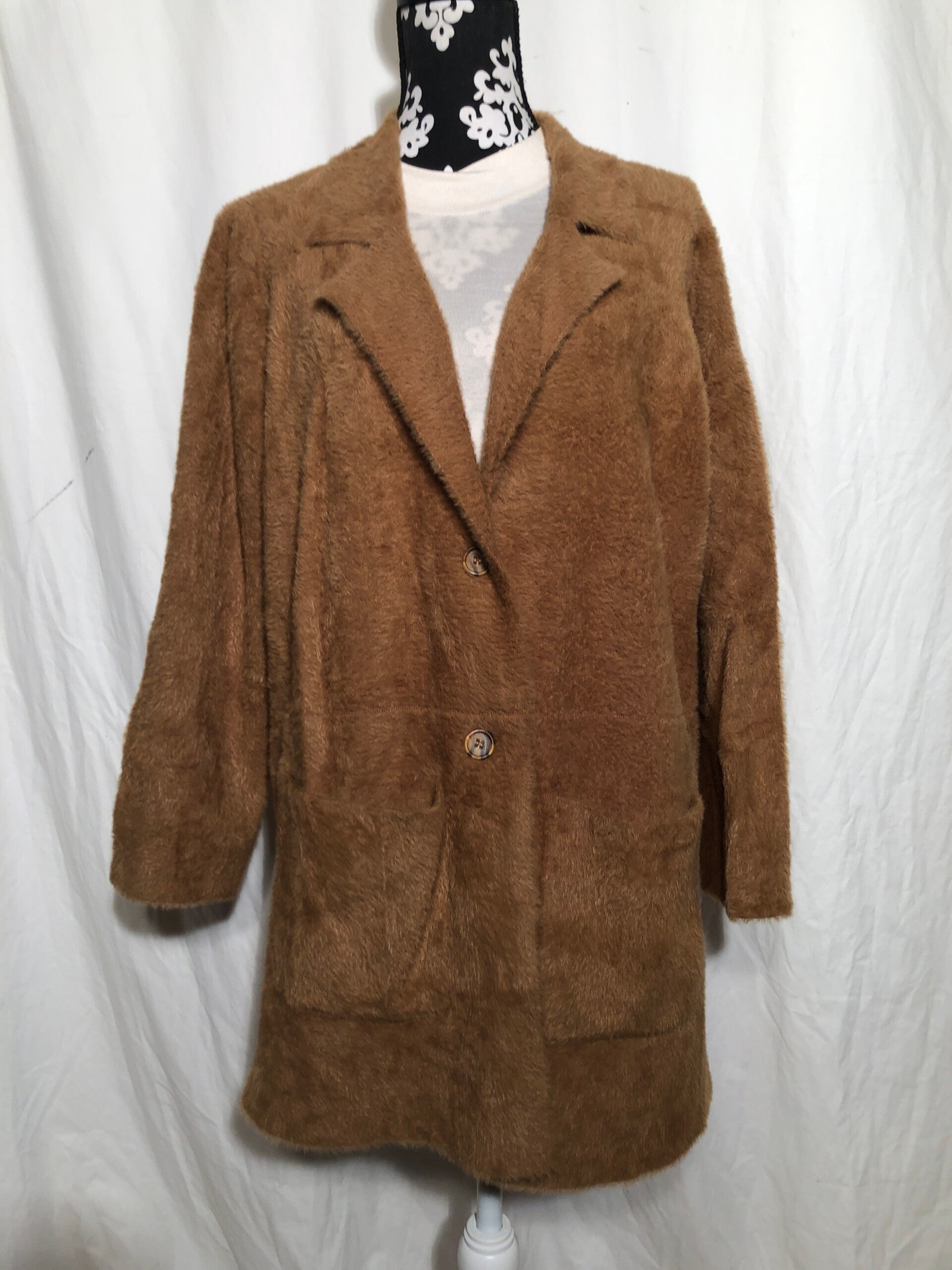 Yesta bruin teddy jasje maat 44