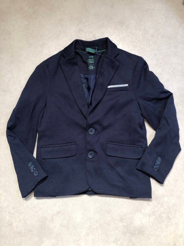 We donkerblauw colbert met spikkeltjes maat 110/116