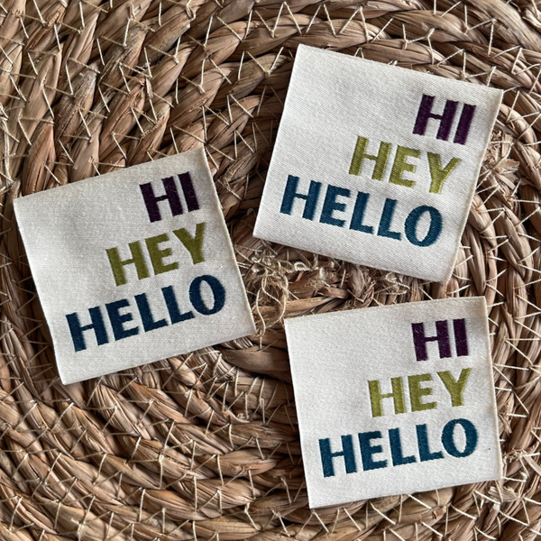 Unfolded label ‘Hey'