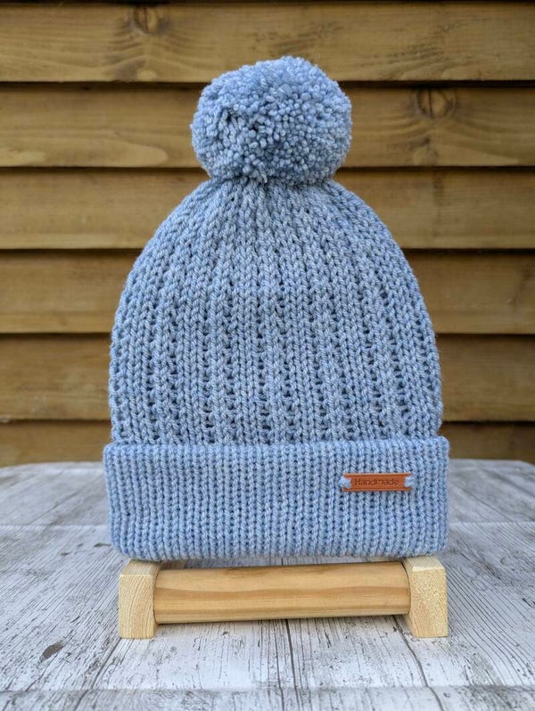 Sky Blue Knitted Hat With Pom Pom
