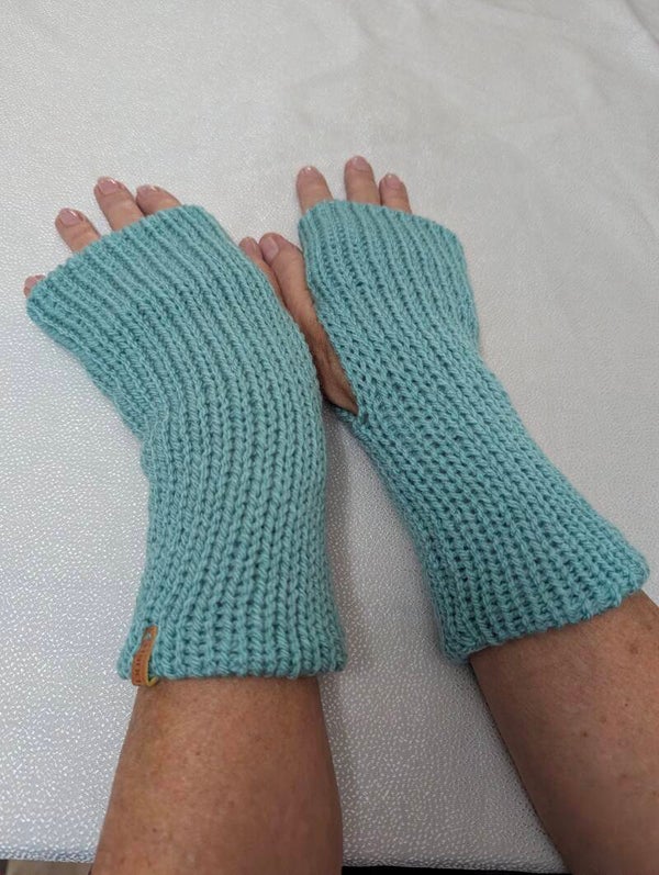 Duck egg blue pair of knitted hand warmers