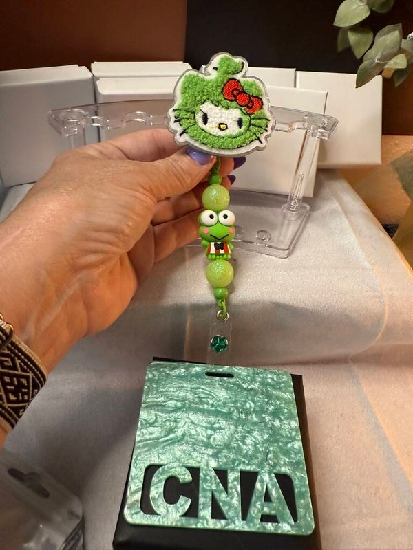 CNA - Hello Kitty & Keroppi Green Spinner Badge Reel with Beaded Charm – Cute & Functional ID Holder IDG100022