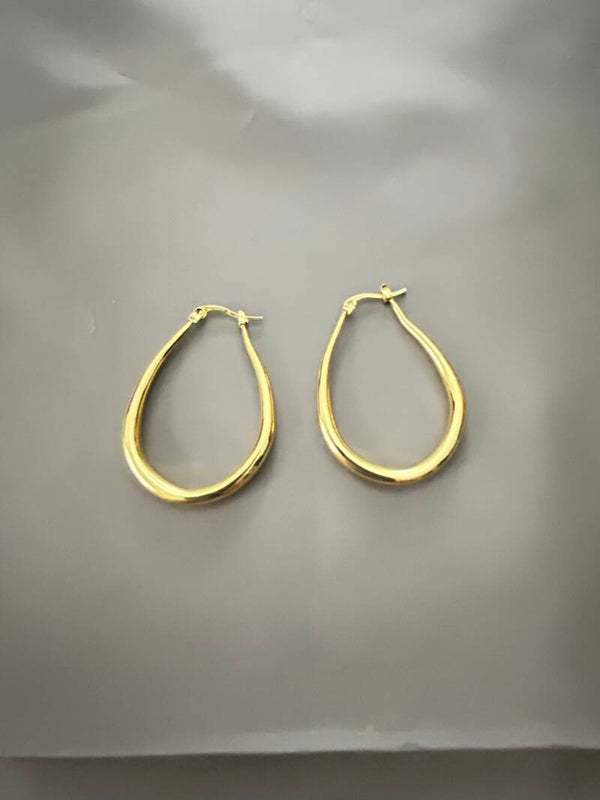 Gold earrings.