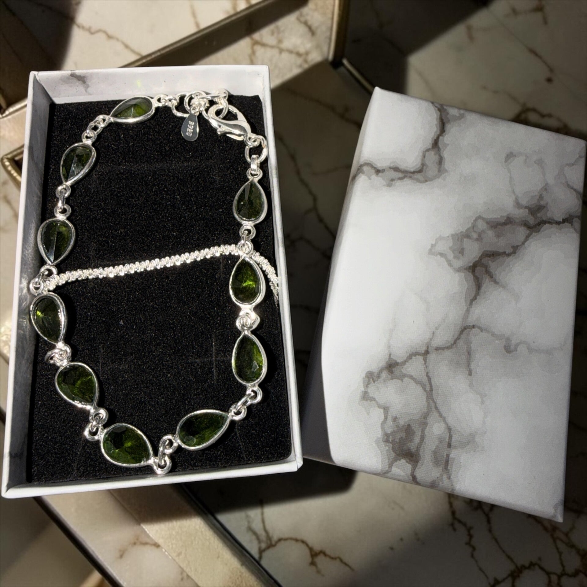 Peridot armbånd og sølv ankelkjede