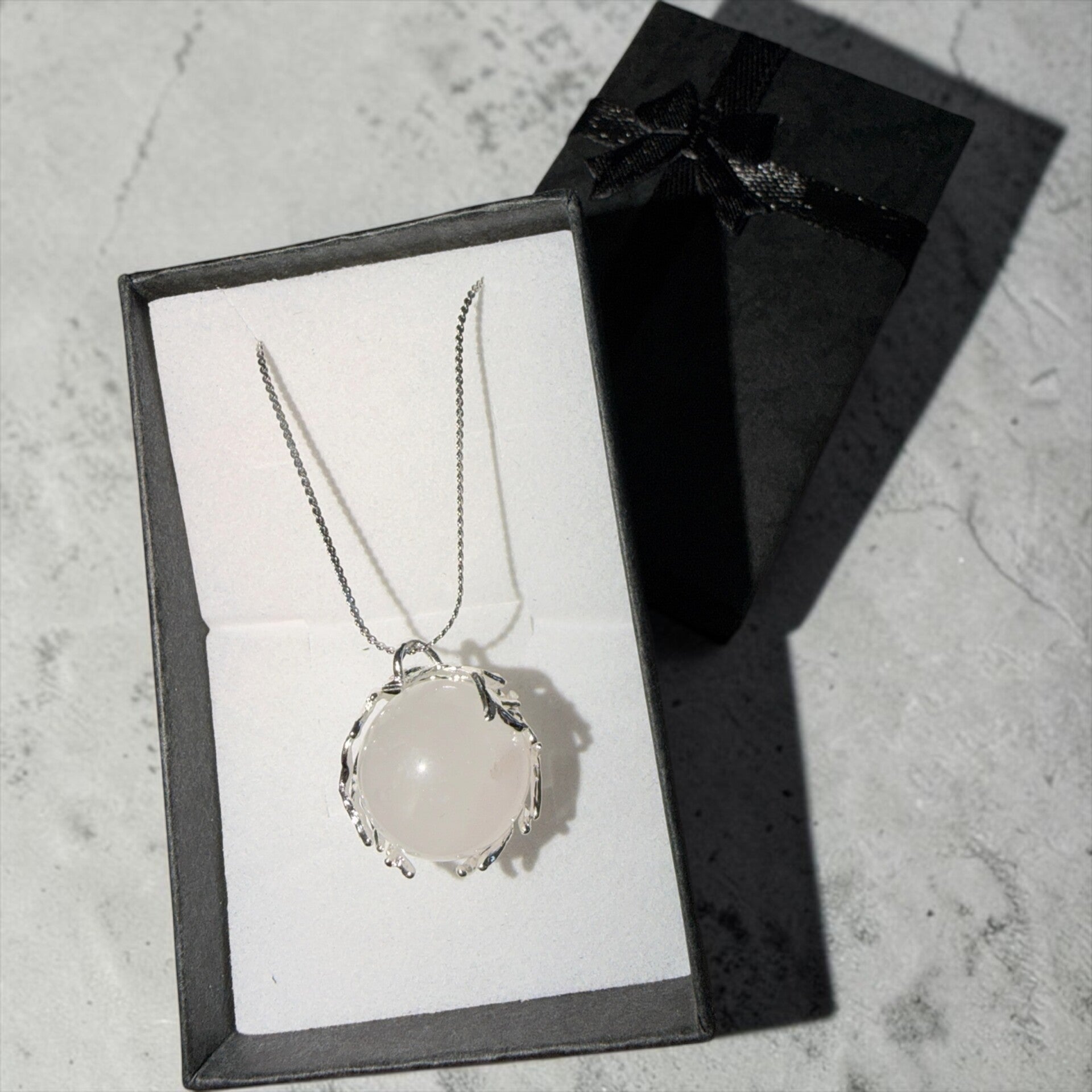 Klar kvarts pendant i stainless steel