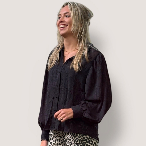 Blouse met subtiele glitter | zwart