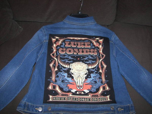 Luke Combs on the back of a jean jacket.
