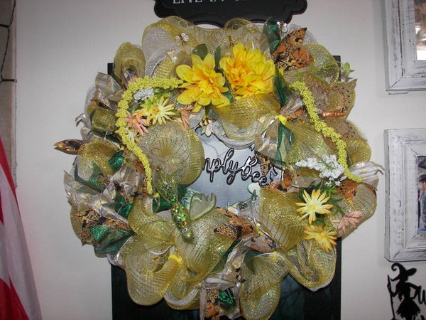 Beautiful Yellow Wreath with flowers and Lights.