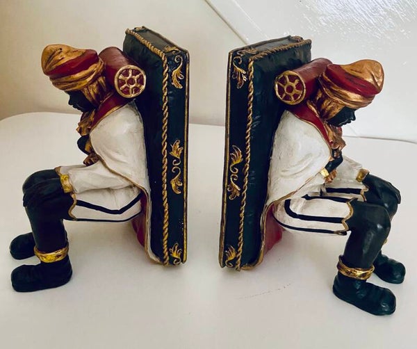 A Pair Of Vintage Sterling Industries Prince Boy Resin Bookends