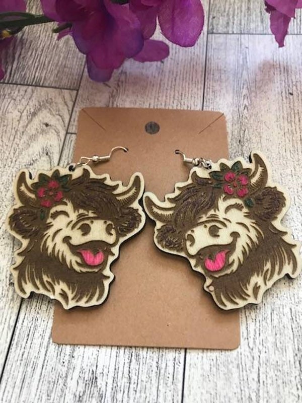 "Smiling Highland" Cows