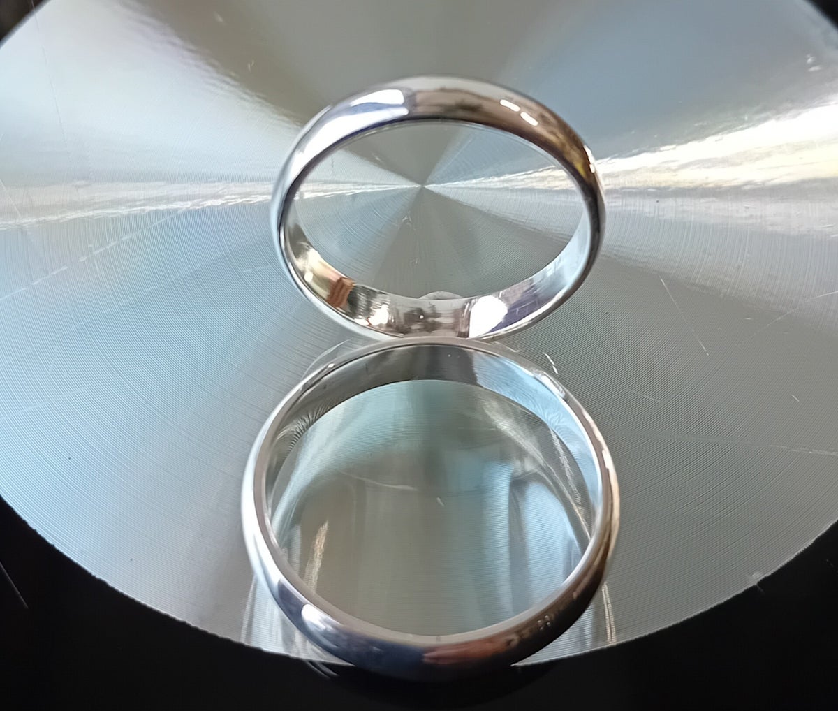 A pair of pure 99.99% silver wedding rings. (D Shape). | s and j silver