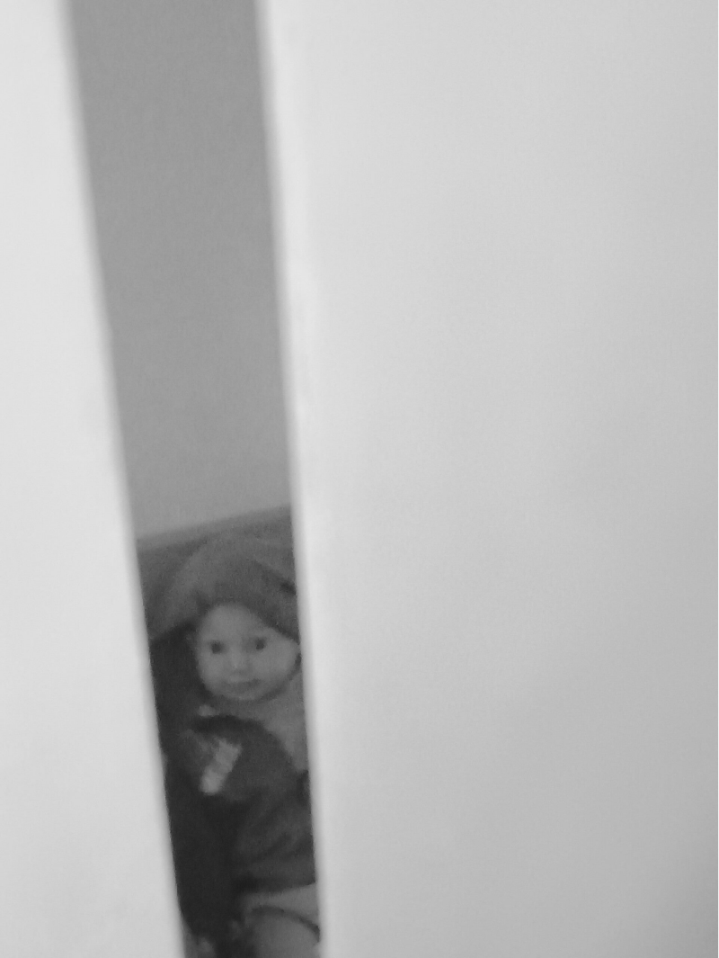 Black‑and‑white photographs exploring boygender identity and inner survival worlds.