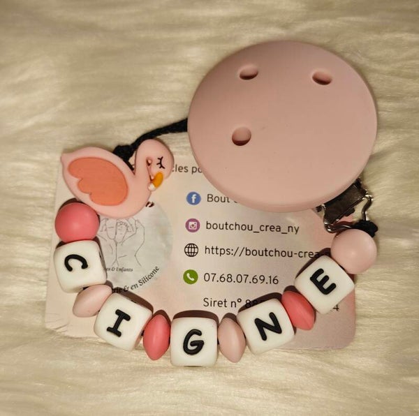 Attache tétine en silicone motif Cigne