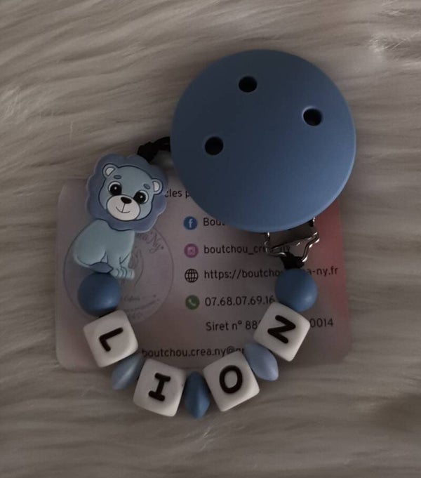 Attache tétine en silicone motif Lion