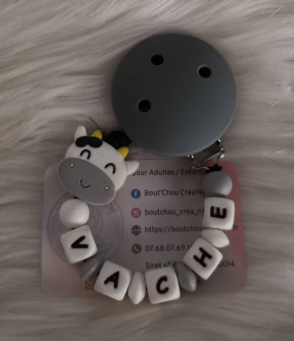 Attache tétine en silicone motif Vache