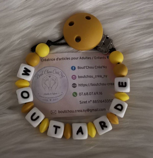 Attache tétine en silicone sans motif moutarde
