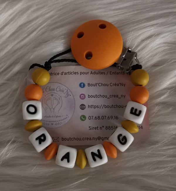 Attache tétine en silicone sans motif orange