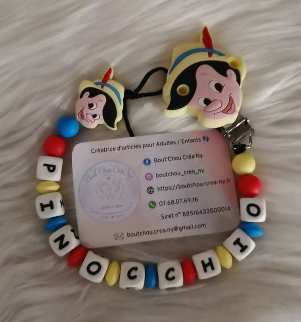 Attache tétine en silicone motif Pinocchio