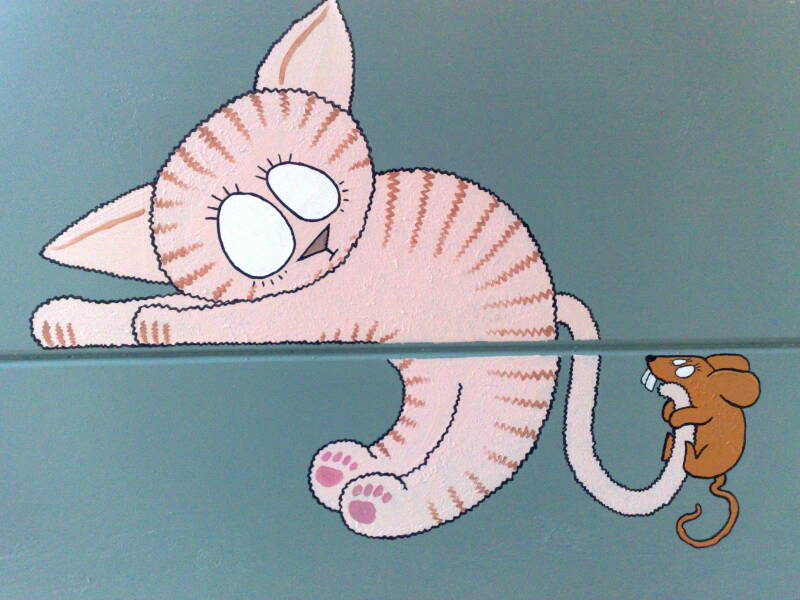 kitty has a mouse (painted bed)