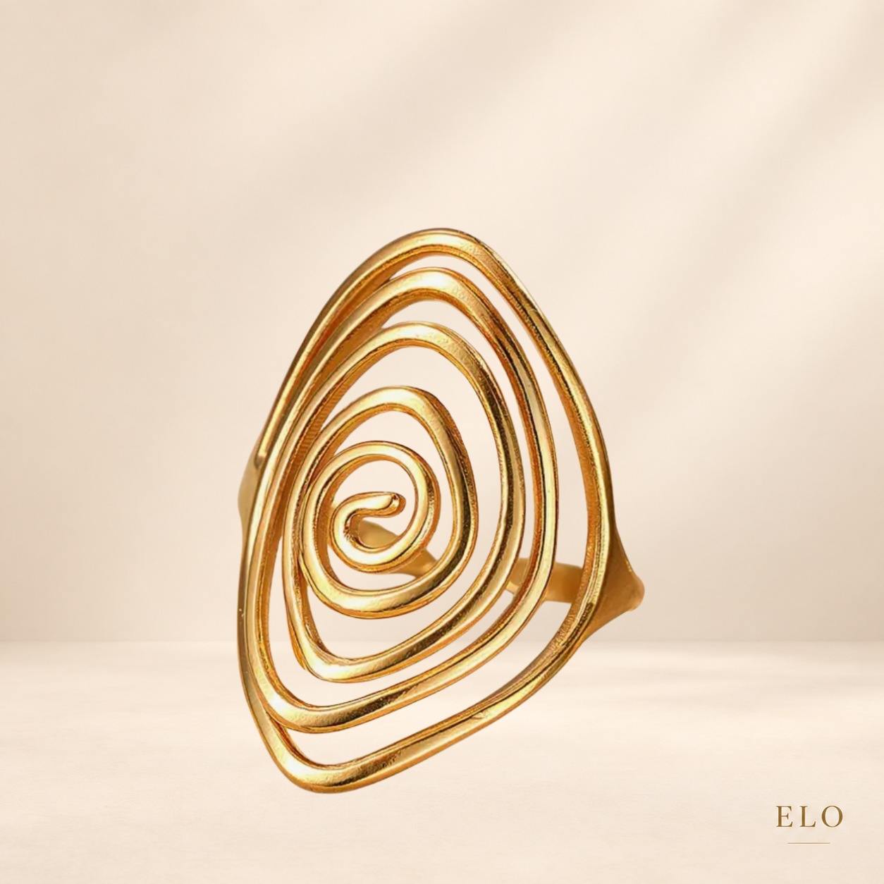 ALMA – Bague dorée spirale