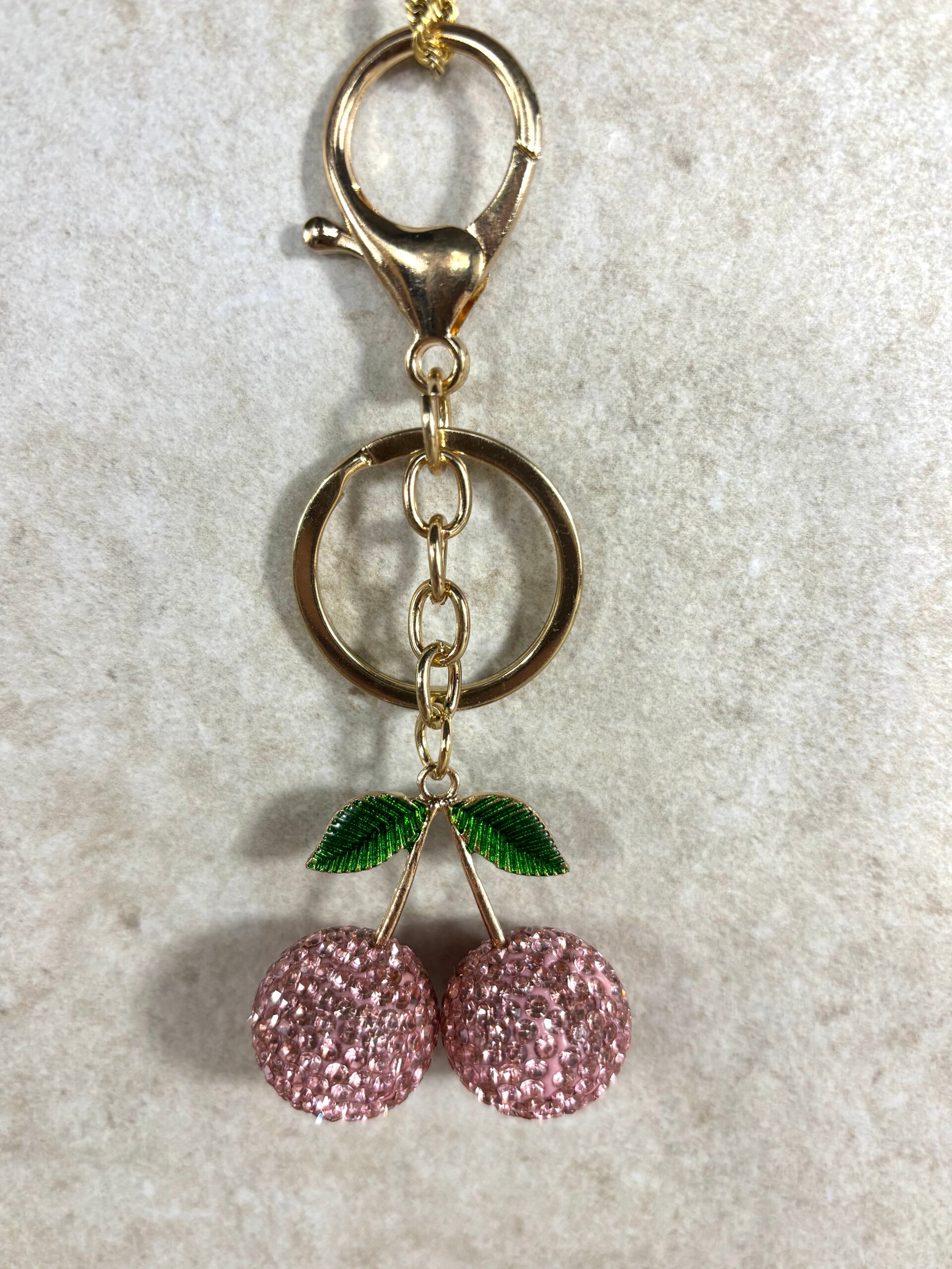 Bijoux de sac cerises roses à strass