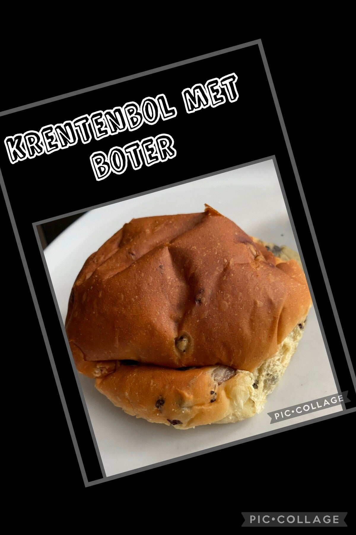 Krentenbol met boter gesmeerd