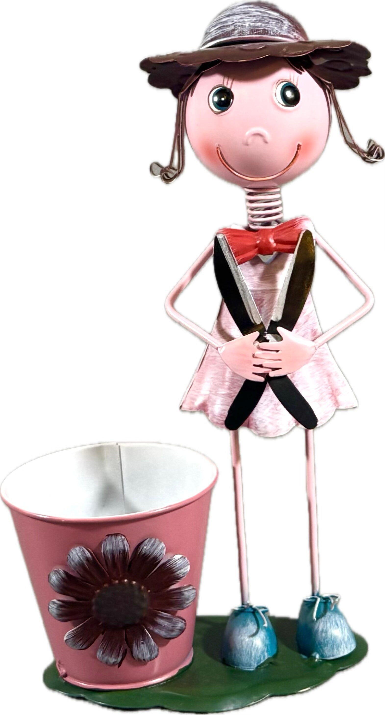 En blomkruka med en söt figur vid sidan om!