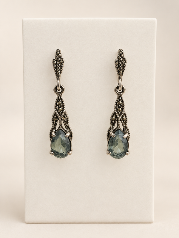 Marcasite oorbellen met blauwe topaas