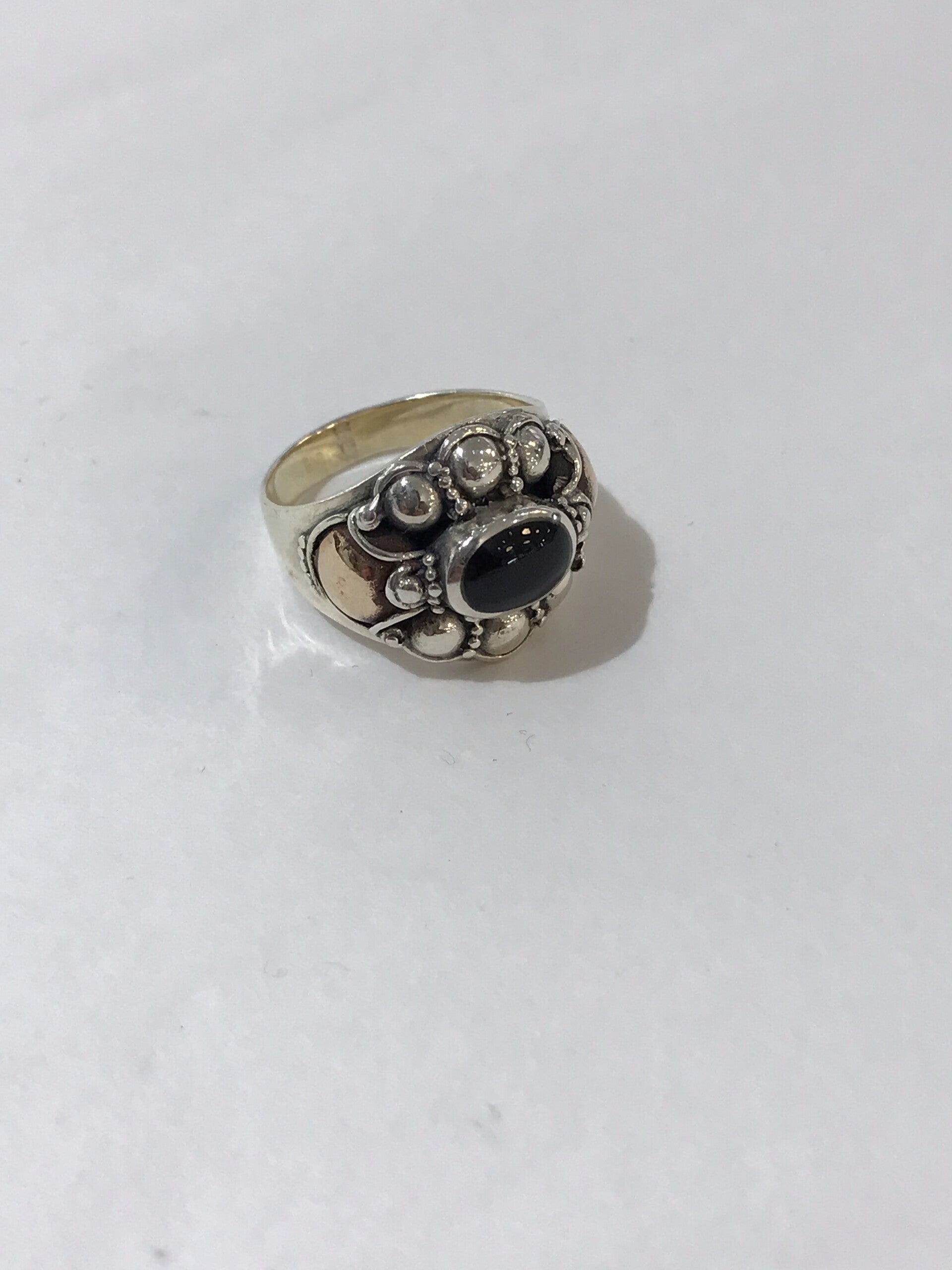 Zilveren ring in 2 kleuren met Onix steen