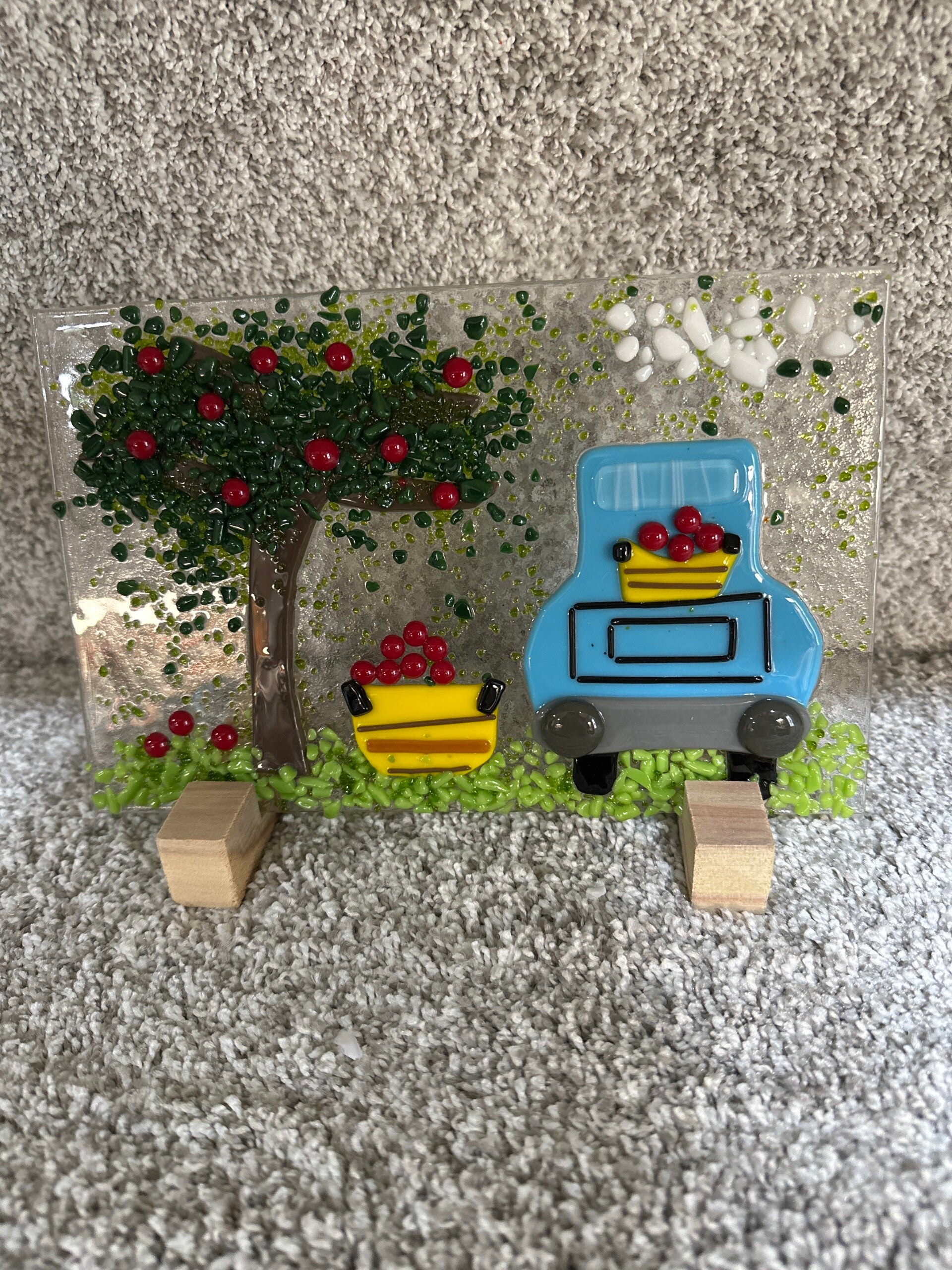 Blue truck and apples