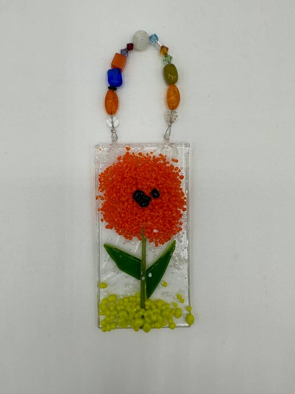 Orange flower sun catcher