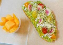 avacado toast w/ feta cheese, cherry tomates and micro greens