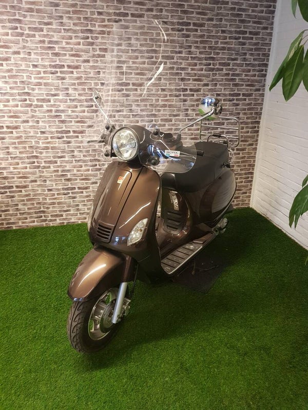 Benda snorscooter vespa look 2014