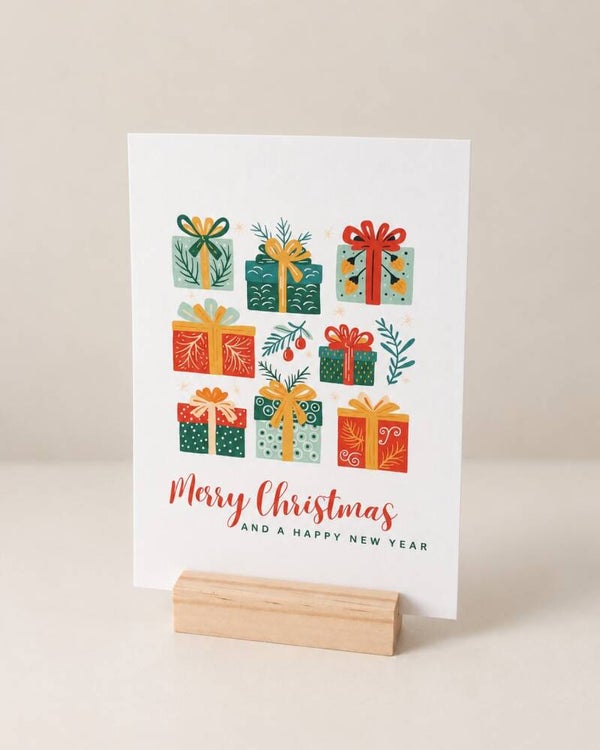 Kerstkaart – Merry Christmas met kleurrijke cadeautjes