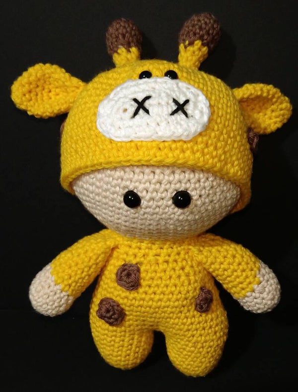 Doll in giraffe onesie