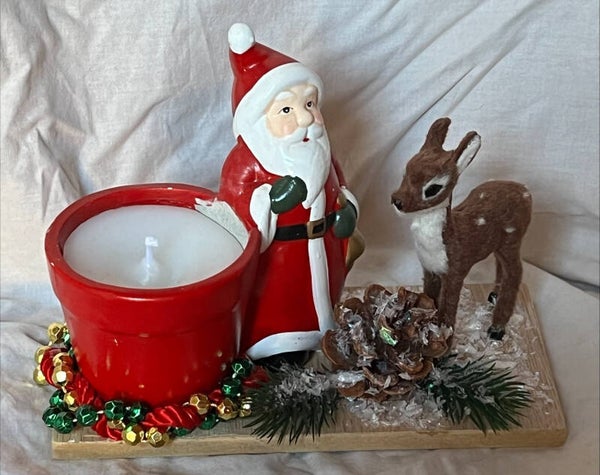 Décoration de Noël avec bougie Père Noël et son faon