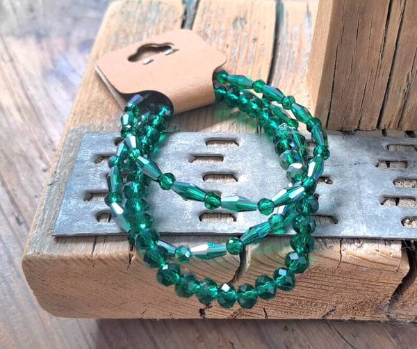 Armbanden smaragdgroen. Elastisch.