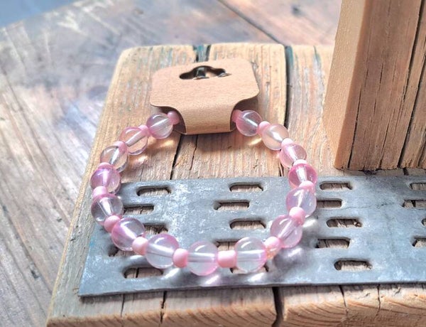 Armband roze gemeleerd. Elastisch.