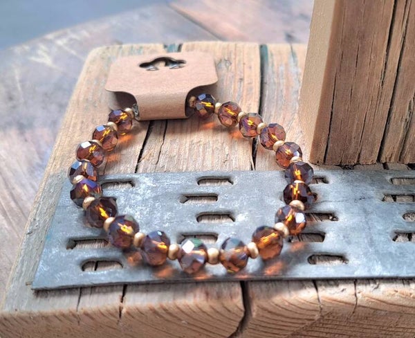 Armband bruin/goud. Elastisch.