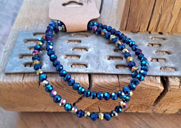 Armbanden cobaltblauw metalic. Elastisch.