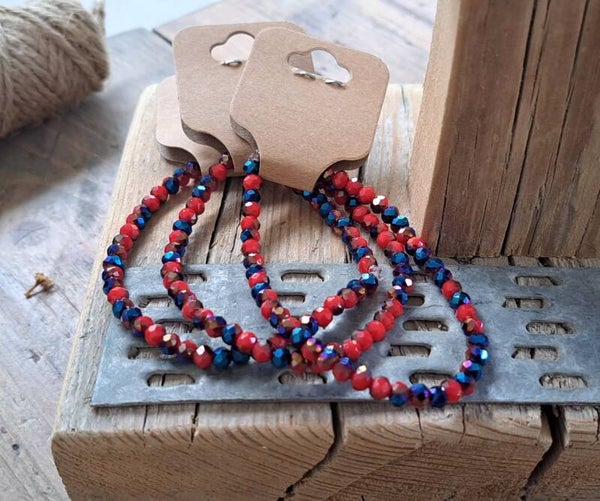 Armbanden rood/blauw. Elastisch.