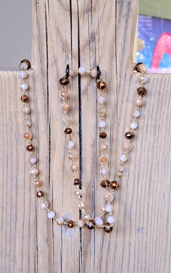 Ketting gehaakt ecru/bruin. 70 cm.