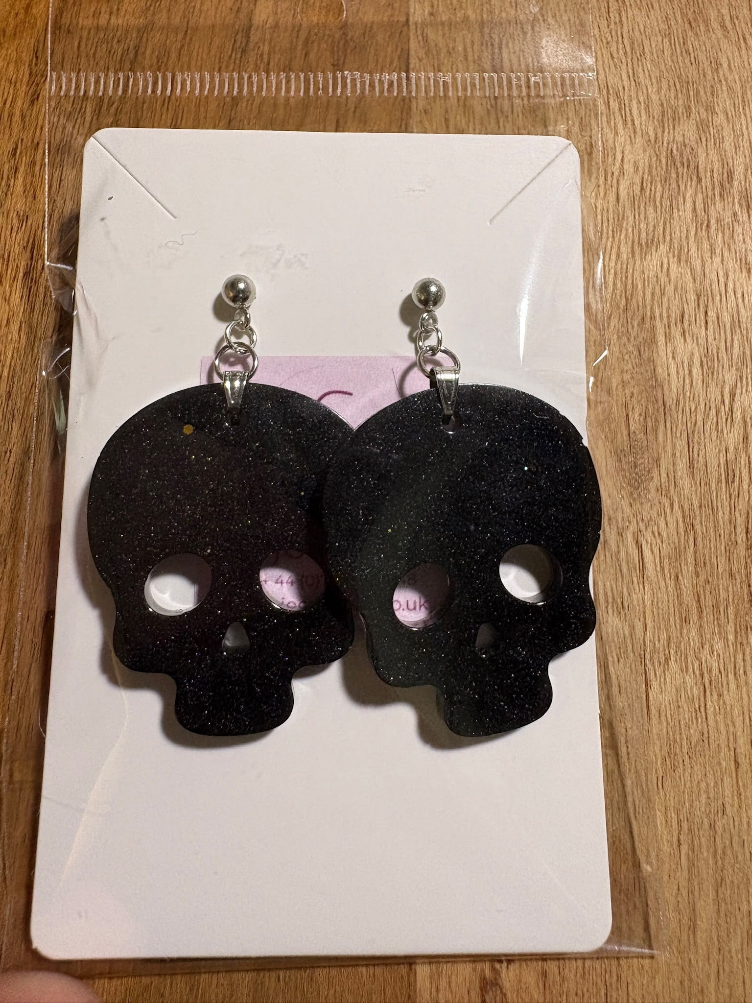 Skull earrings - black shimmer