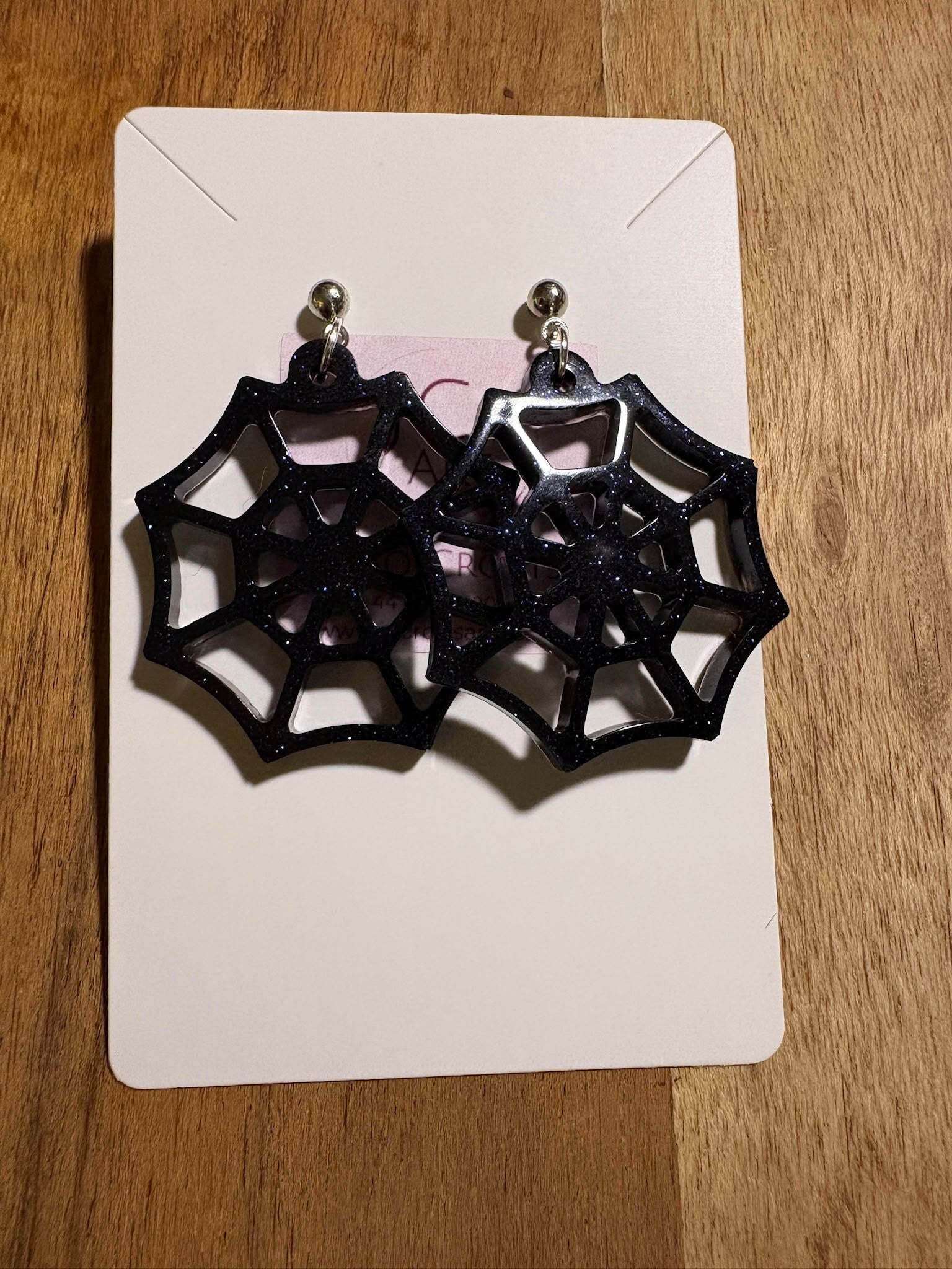 Spider web earrings - black with blue shimmer